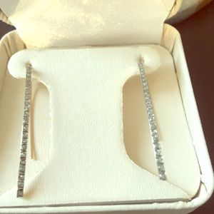 New in box 14 kt gold pierced diamond earrings